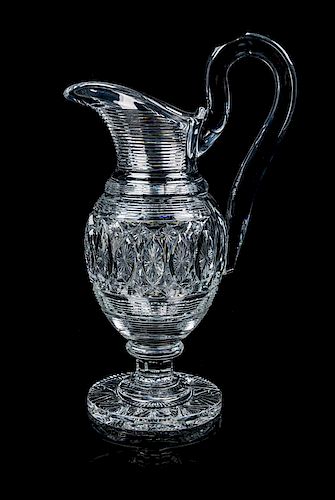 A Baccarat Water Pitcher Height 13 7/8 inches.