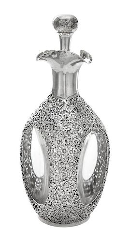 A Silver Overlay Glass Decanter Height 10 1/2 inches.