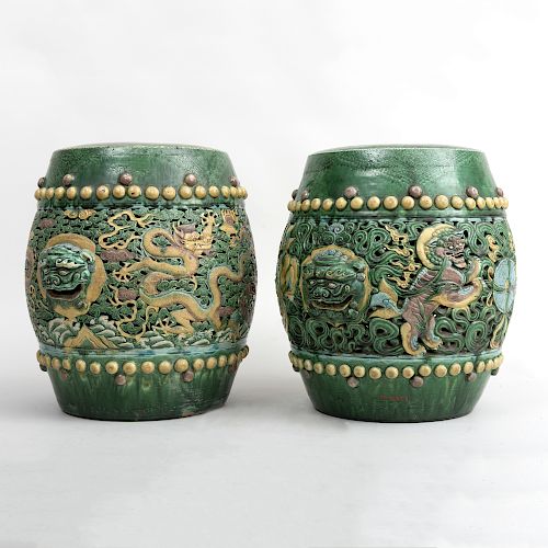 Pair of Chinese Green, Aubergine and Yellow Glazed Pottery Garden Seats with Dragons and Cloud Bands