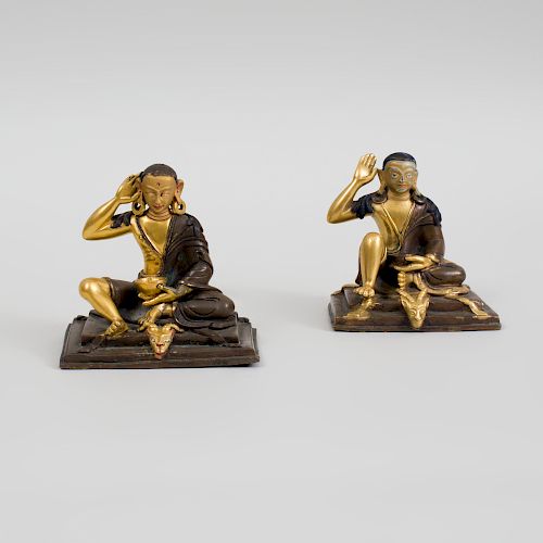  Two Similar Southeast Asian Painted and Parcel-Gilt Bronze Figures of Milarepas