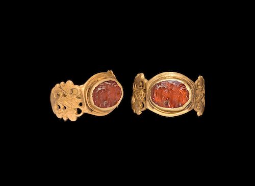 Gold Ring with Mars and Victories Gemstone