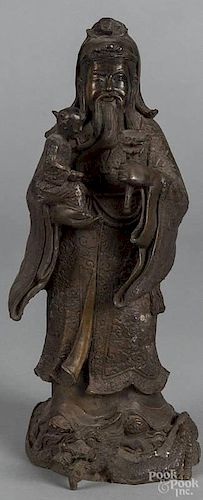 Chinese bronze figure of a man holding a child, 13 1/2'' h.