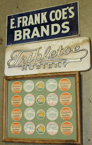 Two small advertising signs and milk cap display