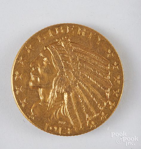 1913 five dollar Indian head gold coin.