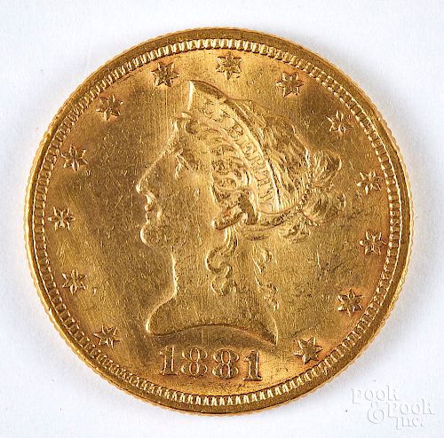 1881 ten dollar Liberty head gold coin.