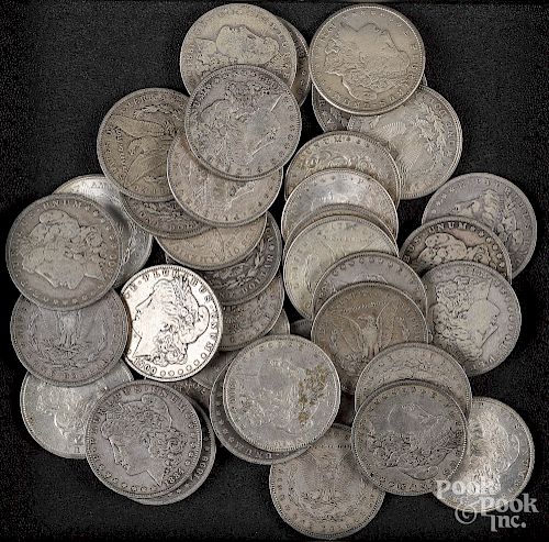 Thirty-seven Morgan silver dollars.