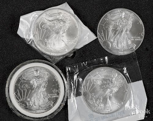 Four American eagle 1 ozt. fine silver coins.