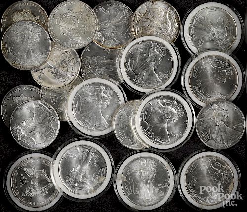Twenty-one American eagle 1 ozt. fine silver coin