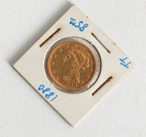 1880 Liberty head five dollar gold coin.
