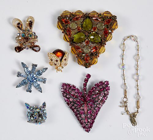 Group of assorted rhinestone pins.