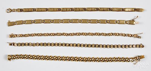 Five 14K gold bracelets, 28.3 dwt.