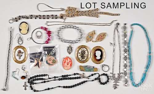 Assorted group of costume jewelry.