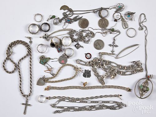 Assorted group of sterling silver jewelry.