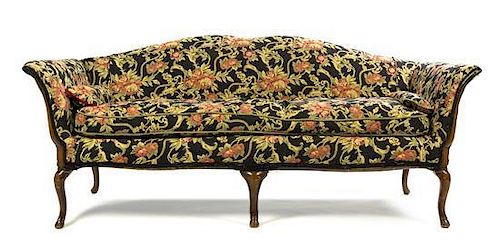 An American Upholstered Settee, Height 33 1/4 x width 78 x depth 33 inches.
