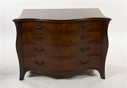 A Georgian Style Mahogany Bombe Chest of Drawers, Height 31 x width 44 x depth 22 1/2 inches.