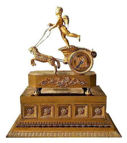 An Ormolu Box and Figural Clock with Case