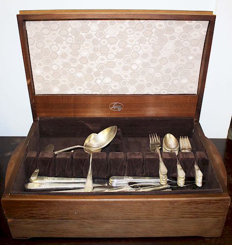 Rogers Bros. silver-plated flatware set in chest
