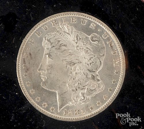 1881-CC Morgan silver dollar NCI MS 65.