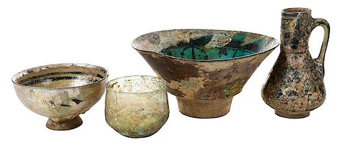 Four Iridescent Roman and Persian Table Items