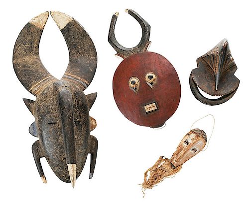 Four African Carved Wooden Masks