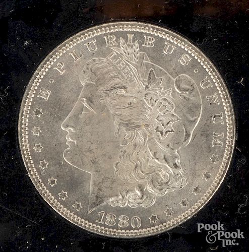 1880 Morgan silver dollar NCI MS 65.