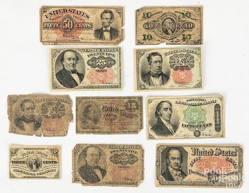 Ten pieces of US fractional currency.