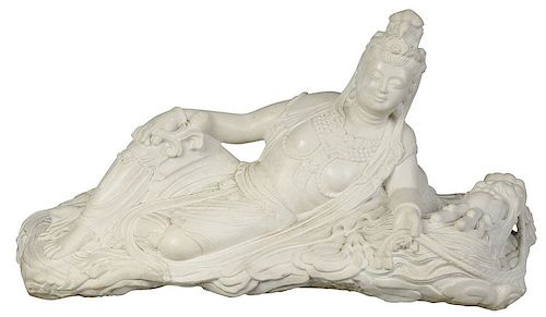 A Carved Marble Figure of Reclining Guanyin