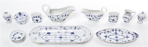 A Royal Copenhagen Assembled Porcelain Dinner Service, Width of wider tray 14 1/2 inches.