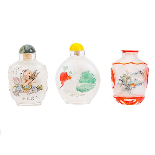Three Chinese reverse painted glass snuff bottles