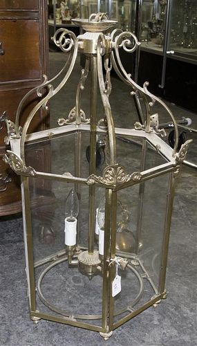 A Brass and Glass Hanging Lantern, Height 22 inches.