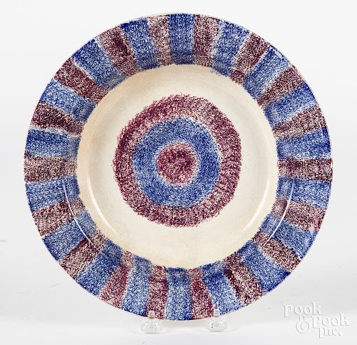 Blue and purple bullseye spatterware shallow bowl