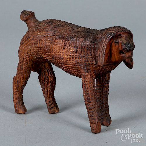 Carved dog, in the style of Aaron Mountz