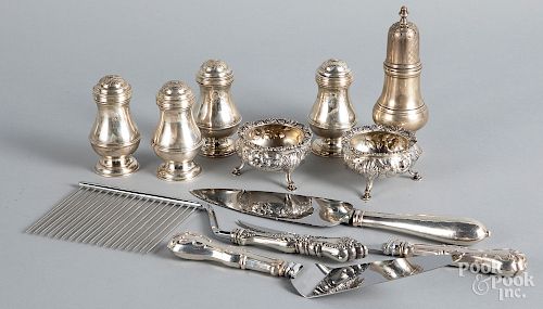 Set of four English silver shakers, etc.