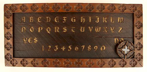 CARVED WOOD OUIJA BOARD IN THE GOTHIC STYLE