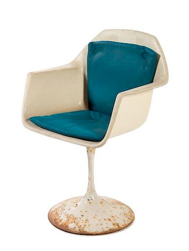 A Molded Fiberglass Lounge Chair Height 33 1/2 inches.