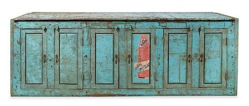 A Turquoise Painted Studio Cabinet Height 35 x width 103 x depth 27 1/2 inches.
