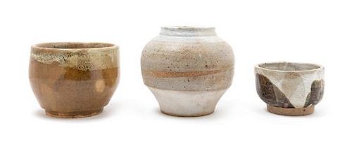 Three Glazed Ceramic Vessels Height of tallest 7 inches.