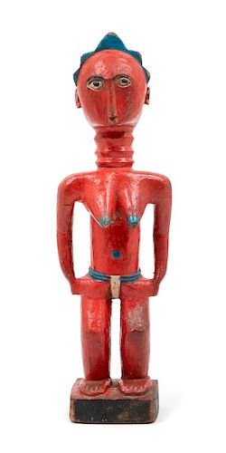 An African Painted Wood Figure Height 13 1/2 inches.