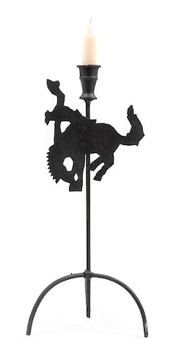 A Painted Metal "Rodeo Cowboy" Candlestick Height overall 16 inches.