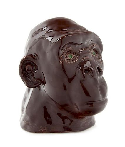 A Glazed Ceramic Bust of a Chimpanzee Height 8 inches.