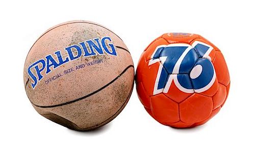 A Spalding Basketball and a Score Soccer Ball Diameter of first 9 inches.