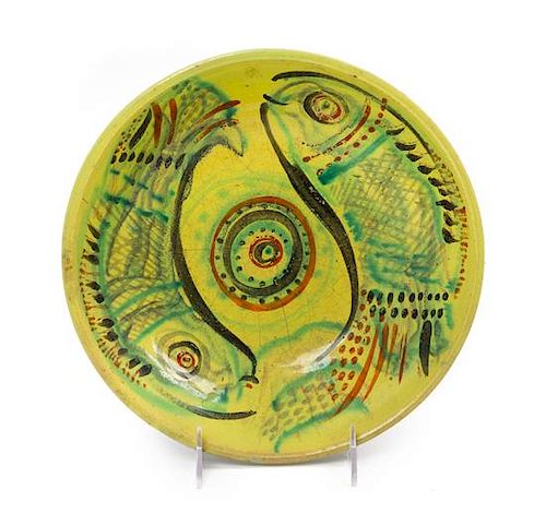 An Israeli Pottery Bowl Decorated with Two Fish Diameter 10 inches.