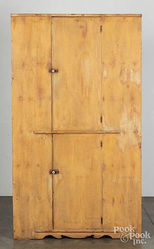 Painted pine one-piece corner cupboard, 19th c.