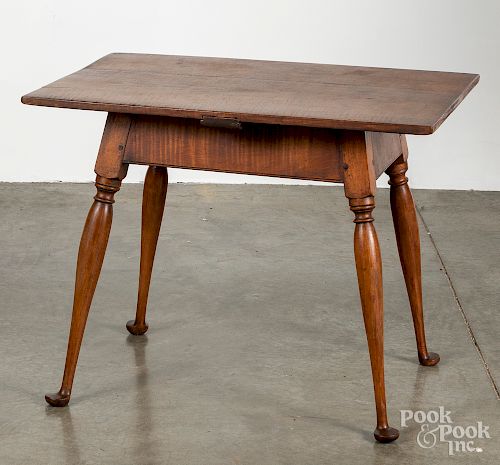 Bench made tiger maple tavern table, 20th c.
