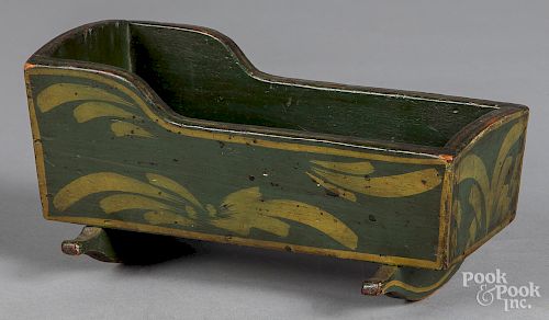 Painted pine doll cradle, late 19th c.