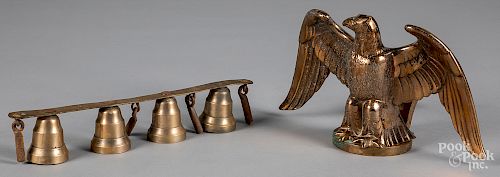 Cast brass eagle, together with a set of bells