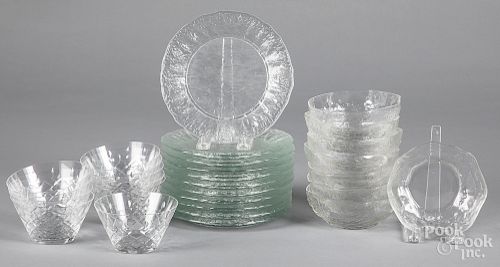 Colorless glass plates and bowls.