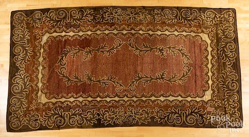 Roomsize hooked rug, early 20th c., 13' x 7'.