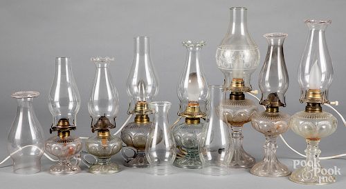 Victorian colorless glass fluid lamps.