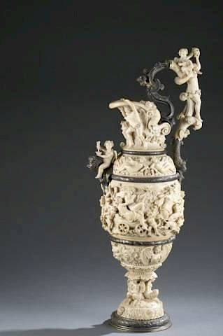 German, 19th c. silver and carved ivory ewer.